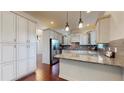 Spacious kitchen with stainless steel appliances, granite countertops, and ample storage at 3615 S Church Ave, Tampa, FL 33629