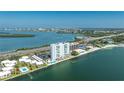 Stunning aerial view of the waterfront condo with access to the bay and beach at 7200 Sunshine Skyway S Ln # 4B, St Petersburg, FL 33711