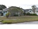 Charming one-story home with lush landscaping and a well-maintained lawn in a desirable location at 10223 Tarragon Dr, Riverview, FL 33569