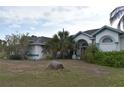 Charming single-Gathering home with lush landscaping and a well-maintained lawn in a desirable community at 10223 Tarragon Dr, Riverview, FL 33569