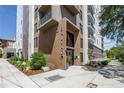 Building entrance featuring modern architecture and landscaping at 199 Dali Blvd # 902, St Petersburg, FL 33701