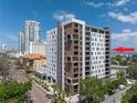 Modern high-rise condo building with sleek architecture, located in a vibrant urban setting at 199 Dali Blvd # 902, St Petersburg, FL 33701