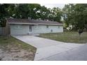 Charming single-story home with a well-maintained driveway and walkway leading to the front door at 4114 E Sewaha St, Tampa, FL 33617