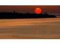 Scenic sunset over the water, creating a serene and picturesque backdrop at 7540 Sunshine Skyway S Ln # 219, St Petersburg, FL 33711
