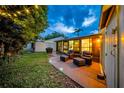 Cozy patio with comfortable seating, perfect for relaxing and enjoying the outdoors at 20 Windrush Bay Dr # 20, Tarpon Springs, FL 34689