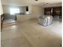 Spacious room featuring a concrete floor and bright natural lighting at 2015 Dolphin S Blvd, St Petersburg, FL 33707