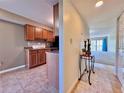 The cozy kitchen flows seamlessly into the living area with balcony access at 2700 Cove Cay Dr # 2B, Clearwater, FL 33760