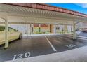 Assigned resident parking spaces under carport structure, close to condo entrance, in a neat community at 120 Cedarwood Cir # 120, Seminole, FL 33777