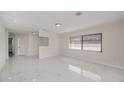 Bright living room with white marble floors and ample natural light at 2167 Corfell St, Port Charlotte, FL 33948