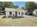 Attractive single-story home featuring a fresh exterior paint and neat front yard at 2604 Oakdale St, Seffner, FL 33584