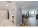 Open concept living area with modern finishes and scenic views through large windows at 6287 Bahia Del Mar Cir # 801, St Petersburg, FL 33715