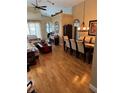 Spacious living and dining areas featuring hardwood floors and natural light at 1747 Wood Brook St, Tarpon Springs, FL 34689