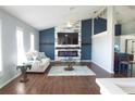 A spacious living room features a fireplace and stylish decor at 320 Crosswinds Dr, Palm Harbor, FL 34683