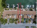 Waterfront townhome featuring a private boat dock and parking at 829 E Gulf Blvd # 107, Indian Rocks Beach, FL 33785
