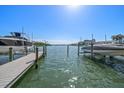 Waterfront condo featuring a private boat dock with deep water access at 829 E Gulf Blvd # 107, Indian Rocks Beach, FL 33785
