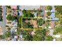 Bird's-eye view showcasing the property's location with mature trees and neighborhood at 111 Orangeview Ave, Clearwater, FL 33755
