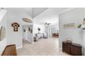 Open and airy entryway leading into dining and living area with views to the rest of the home at 2517 Cumberland Cliff Dr, Ruskin, FL 33570