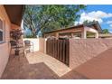 Cozy brick patio with seating, offering a private outdoor space for relaxation and entertainment at 7242 55Th N Ave, St Petersburg, FL 33709