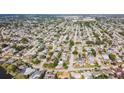 Expansive aerial view showcasing the density of homes, green spaces, and the overall community layout at 7534 Culberson Dr, Port Richey, FL 34668