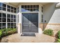 Stylish double front door with sidelights and transom window for a grand entrance at 980 Live Oak Ne Ave, St Petersburg, FL 33703