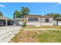 Cozy single-story home with a convenient carport and easy street access at 3007 Aileen W St, Tampa, FL 33607