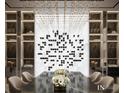 Dining area with modern art wine display and modern chandelier lighting at 602 & 604 Channel Dr, Tampa, FL 33606