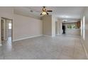 Spacious living room featuring tile flooring and ample natural light at 925 Windton Oak Dr, Ruskin, FL 33570