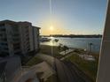Waterfront community with lush landscaping, waterways, and amenities like a mini golf course and bbq grills at 1 Key Capri # 502E, Treasure Island, FL 33706