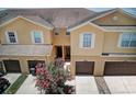 Aerial view of the townhomes shows well-kept lawns and a shared entryway at 1984 Hawks View Dr, Ruskin, FL 33570