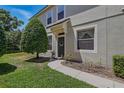 Inviting front entrance showcasing a well-manicured lawn and lovely landscaping details at 4815 Barnstead Dr, Riverview, FL 33578