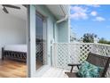 Relax on the private balcony with a view, perfect for enjoying a morning coffee or evening relaxation at 623 Garland Cir, Indian Rocks Beach, FL 33785