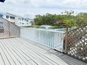 Scenic view from the deck, overlooking the water fountain and lush greenery at 11351 Shipwatch Ln # 1844, Largo, FL 33774
