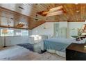 Main bedroom loft with skylight and ceiling fan, offering bright natural light at 919 Sandpiper S Way, St Petersburg, FL 33707