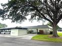 Well-maintained home with an attached carport and neatly manicured lawn at 3411 Teeside Dr, New Port Richey, FL 34655