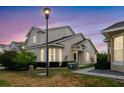 Exterior daytime shot of two-story home featuring well-kept landscaping at 6260 Olivedale Dr, Riverview, FL 33578