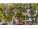 Aerial view of property surrounded by lush greenery in a residential neighborhood at 1007 Jones St, Clearwater, FL 33755