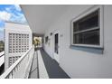 Hallway view showing unit door number 602 and updated features and decor throughout the building at 5925 Shore S Blvd # 602, Gulfport, FL 33707