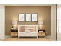 Comfortable Bedroom with stylish décor, a crib, and elegant bedside tables at 10290 Purple Leaf Ct, Riverview, FL 33578