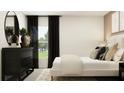 A well-lit primary bedroom showcases a black dresser, comfortable bedding, and large window with natural light at 13167 Violet Flame Ave, Wimauma, FL 33598