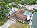 Overhead shot of a home featuring a pool, backyard, and boat, providing a detailed view at 5920 Denver Ne St, St Petersburg, FL 33703