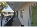 Condo building balcony with outdoor access at 614 Guild Dr # 15, Venice, FL 34285