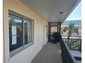Condo building balcony with outdoor access at 614 Guild Dr # 15, Venice, FL 34285