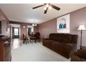 Inviting living room with cozy furnishings and neutral tones, creating a comfortable and relaxing space at 1316 Pasadena S Ave # 303, South Pasadena, FL 33707