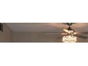 Close up of a modern ceiling fan with a decorative light fixture at 2360 World Parkway Blvd # 36, Clearwater, FL 33763