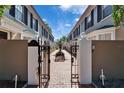 Beautiful townhomes with walkway, bench, and landscaping make for a great community at 308 S Bungalow Park Ave # B, Tampa, FL 33609