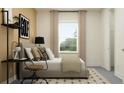 Stylishly furnished bedroom showcasing a comfortable bed, modern desk, and natural light from the window at 6905 E 116Th Ct, Palmetto, FL 34221