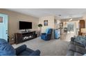Cozy living room features a fireplace and comfortable seating for relaxation at 9743 36Th N Way # 4, Pinellas Park, FL 33782