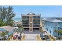 Beautiful contemporary condo building with ocean views from multiple stories and private balconies at 19910 Gulf Boulevard # 102, Indian Shores, FL 33785