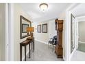 Hallway features decorative furnishings and neutral wall colors at 19910 Gulf Boulevard # 102, Indian Shores, FL 33785