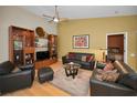Comfortable living room featuring plush leather furniture and stylish decor at 3079 Landmark Blvd # 1608, Palm Harbor, FL 34684